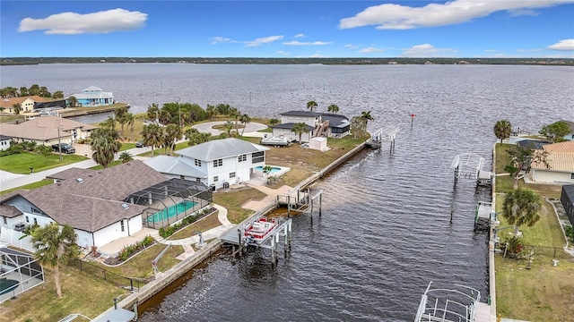 drone / aerial view with a water view