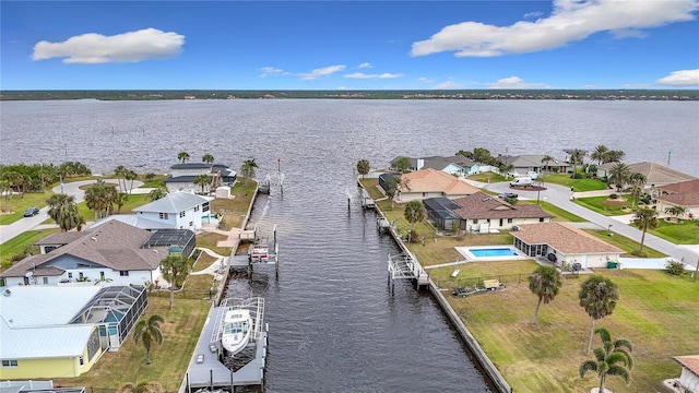 bird's eye view with a water view