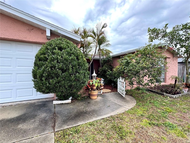 view of yard featuring a garage