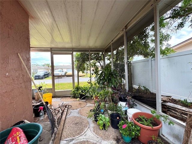 sunroom with wooden ceiling