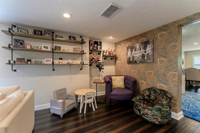 sitting room featuring hardwood / wood-style floors