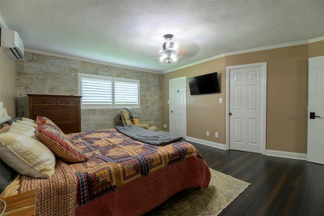 bedroom with ceiling fan, an AC wall unit, dark hardwood / wood-style floors, ornamental molding, and a textured ceiling