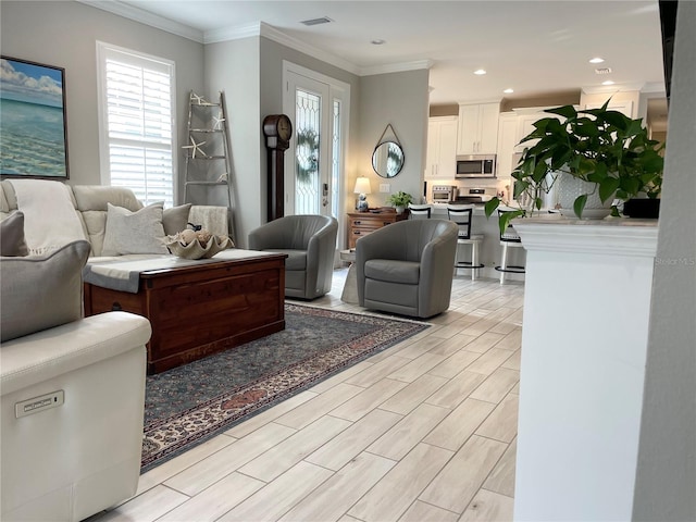 living room with crown molding