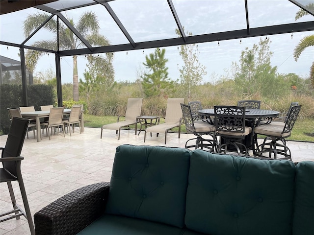 view of patio / terrace with a lanai