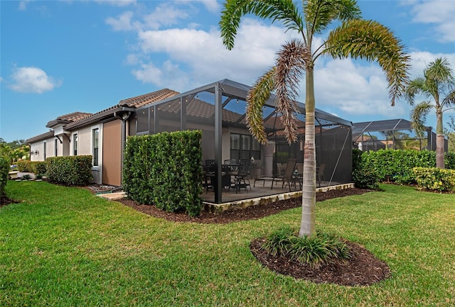 exterior space with a lanai and a patio