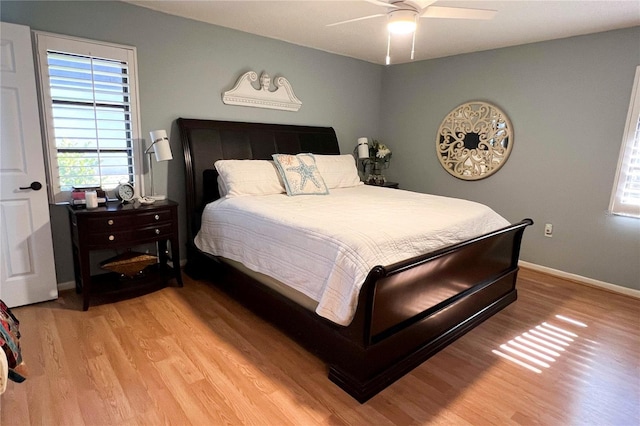 bedroom featuring ceiling fan and light hardwood / wood-style floors