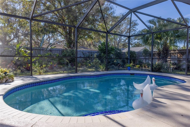 view of pool featuring a lanai and a patio