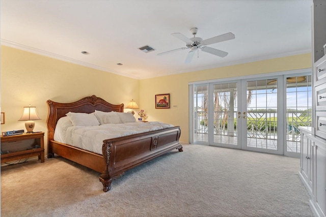 carpeted bedroom with french doors, ceiling fan, ornamental molding, and access to exterior