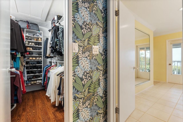 walk in closet featuring tile patterned flooring