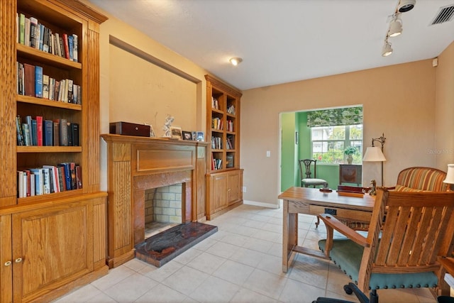 home office featuring built in shelves