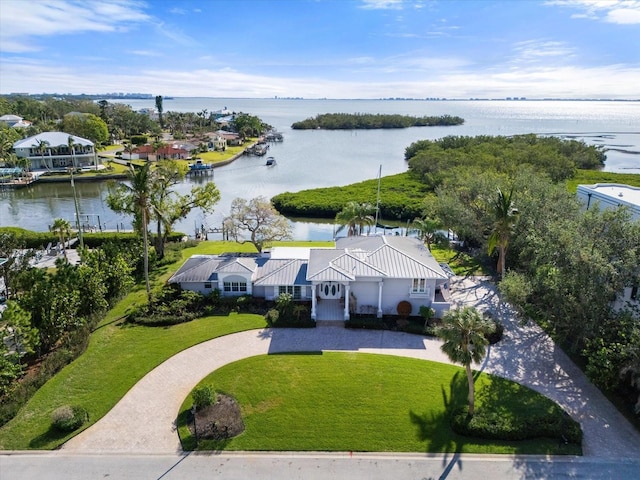 drone / aerial view with a water view