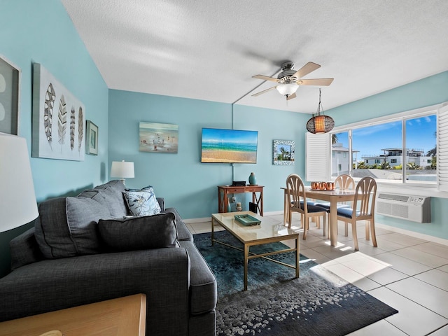 tiled living room with a textured ceiling and ceiling fan