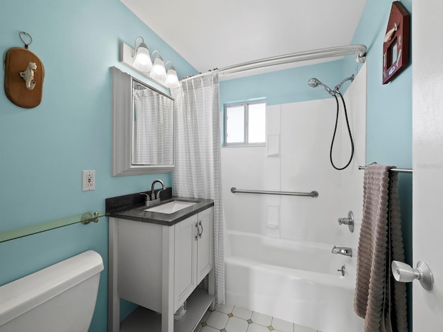 full bathroom featuring toilet, shower / bath combo, and vanity