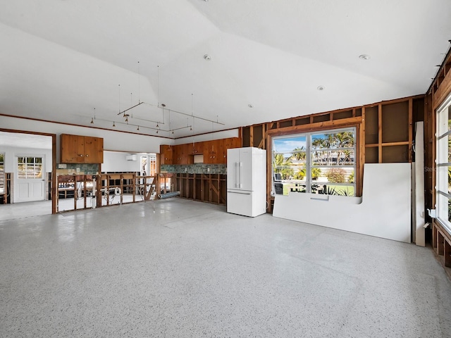 garage with white refrigerator