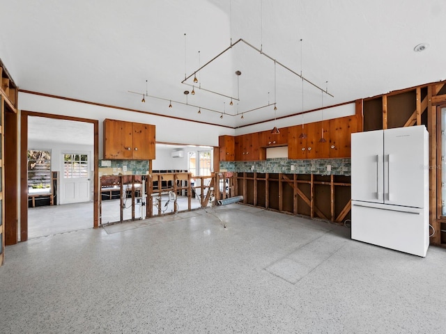 garage with white refrigerator