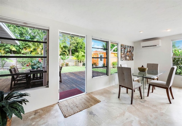 dining space featuring an AC wall unit