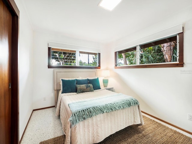 carpeted bedroom featuring a closet