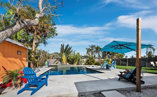 view of swimming pool featuring a patio