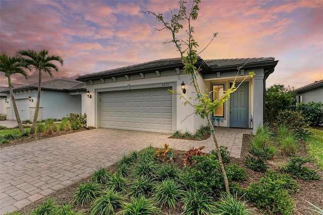 view of front of home with a garage