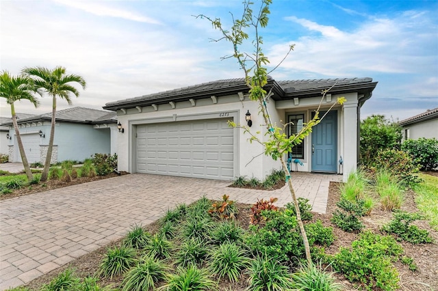 ranch-style house featuring a garage