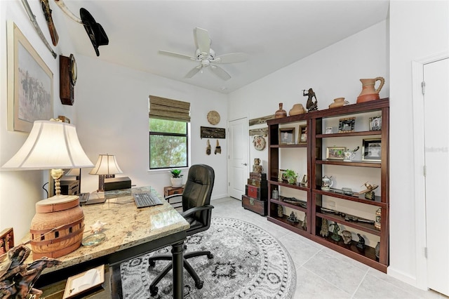 office area with ceiling fan and light tile patterned floors