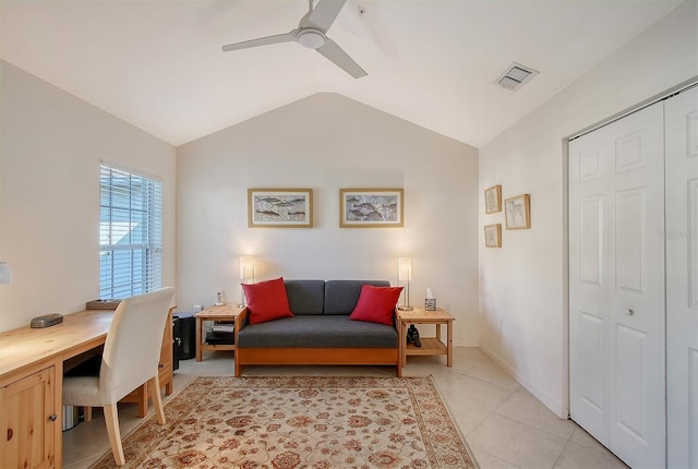 tiled office space with ceiling fan and lofted ceiling