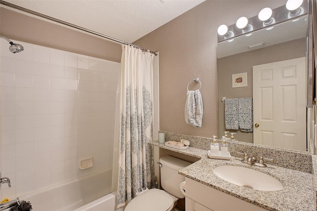 full bathroom featuring a textured ceiling, toilet, vanity, and shower / tub combo with curtain