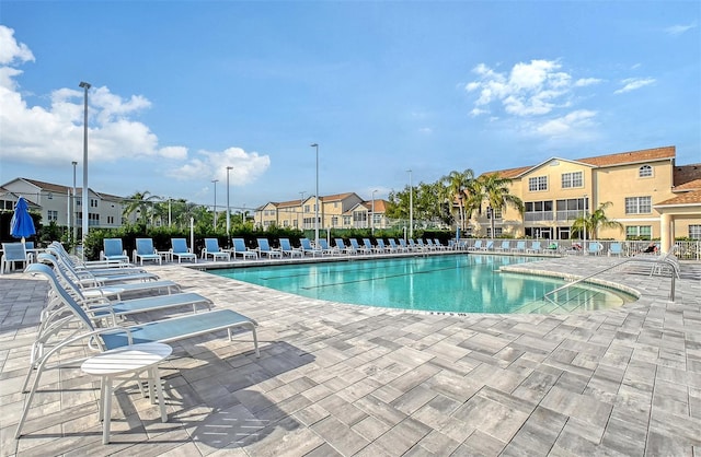 view of pool featuring a patio area