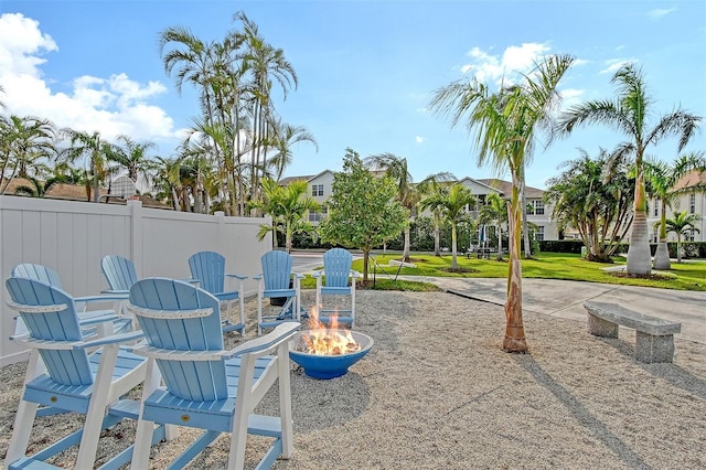 view of patio featuring an outdoor fire pit