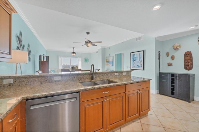 kitchen featuring light tile patterned floors, dishwasher, light stone countertops, crown molding, and sink