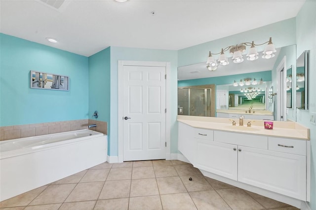 bathroom featuring vanity, separate shower and tub, and tile patterned flooring