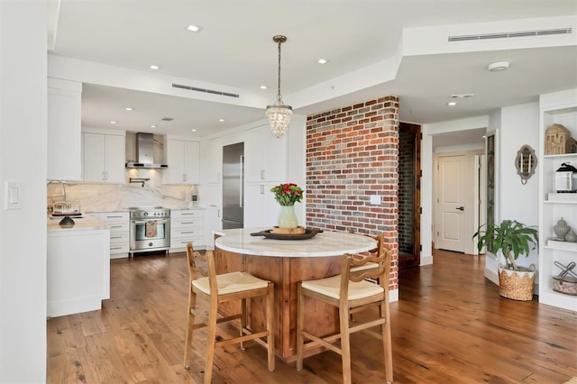 3060 Grand Bay Blvd Unit 175, Longboat Key, FL 34228 - dining room with wood finished floors and recessed lighting