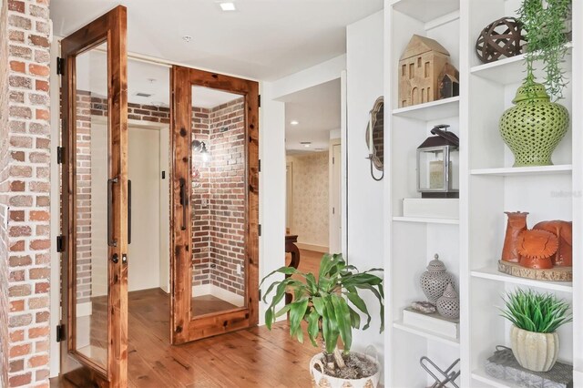 3060 Grand Bay Blvd Unit 175, Longboat Key, FL 34228 - hall featuring wood finished floors