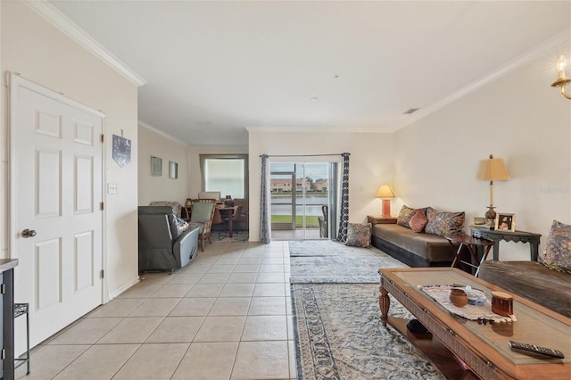 living room with light tile patterned floors and ornamental molding