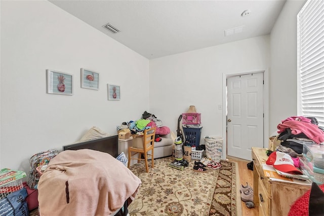 bedroom featuring wood-type flooring