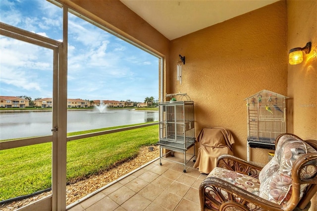 sunroom with a water view