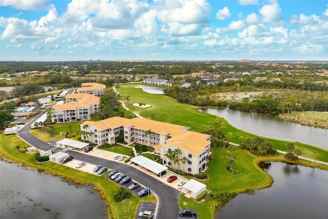 bird's eye view with a water view