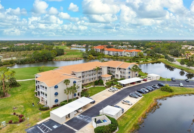 drone / aerial view with a water view