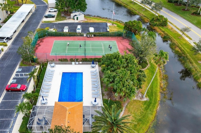 drone / aerial view with a water view