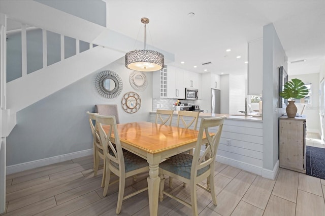 dining space with sink