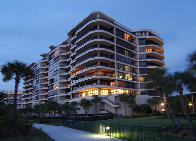 view of outdoor building at dusk