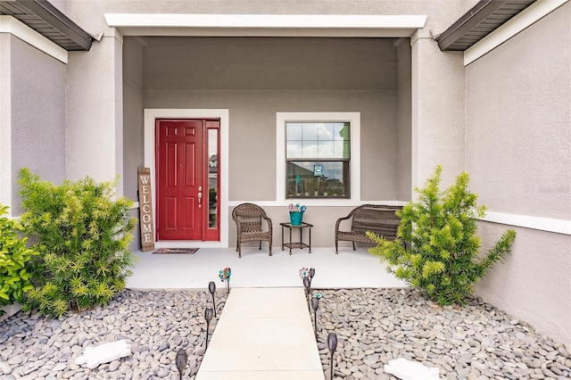 property entrance with a porch