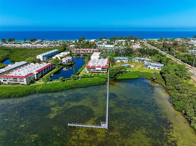 drone / aerial view with a water view