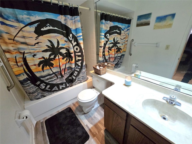 bathroom featuring vanity, toilet, wood finished floors, and shower / bath combo with shower curtain