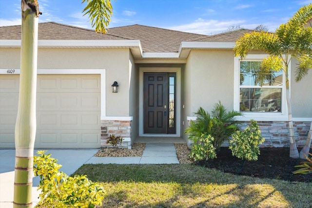 entrance to property featuring a garage