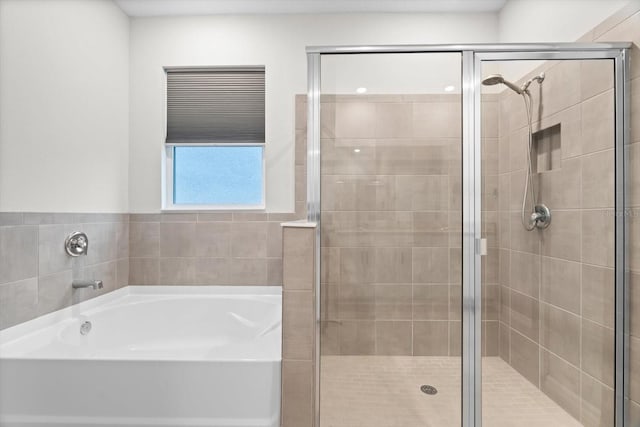 bathroom with independent shower and bath