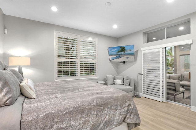 bedroom with light wood-type flooring