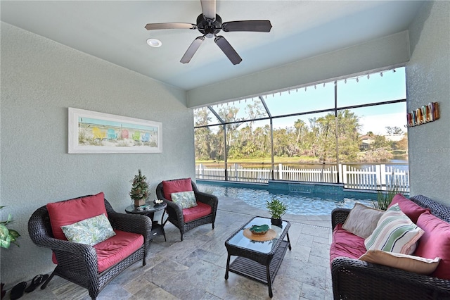 interior space featuring a water view and ceiling fan