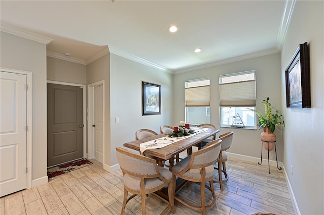 dining space with crown molding