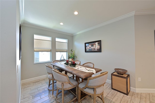 dining space featuring ornamental molding